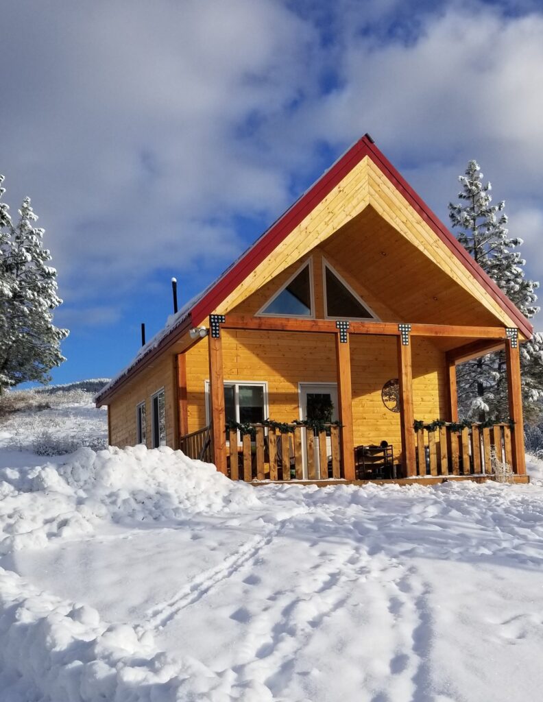 a wooden house in a showy weather